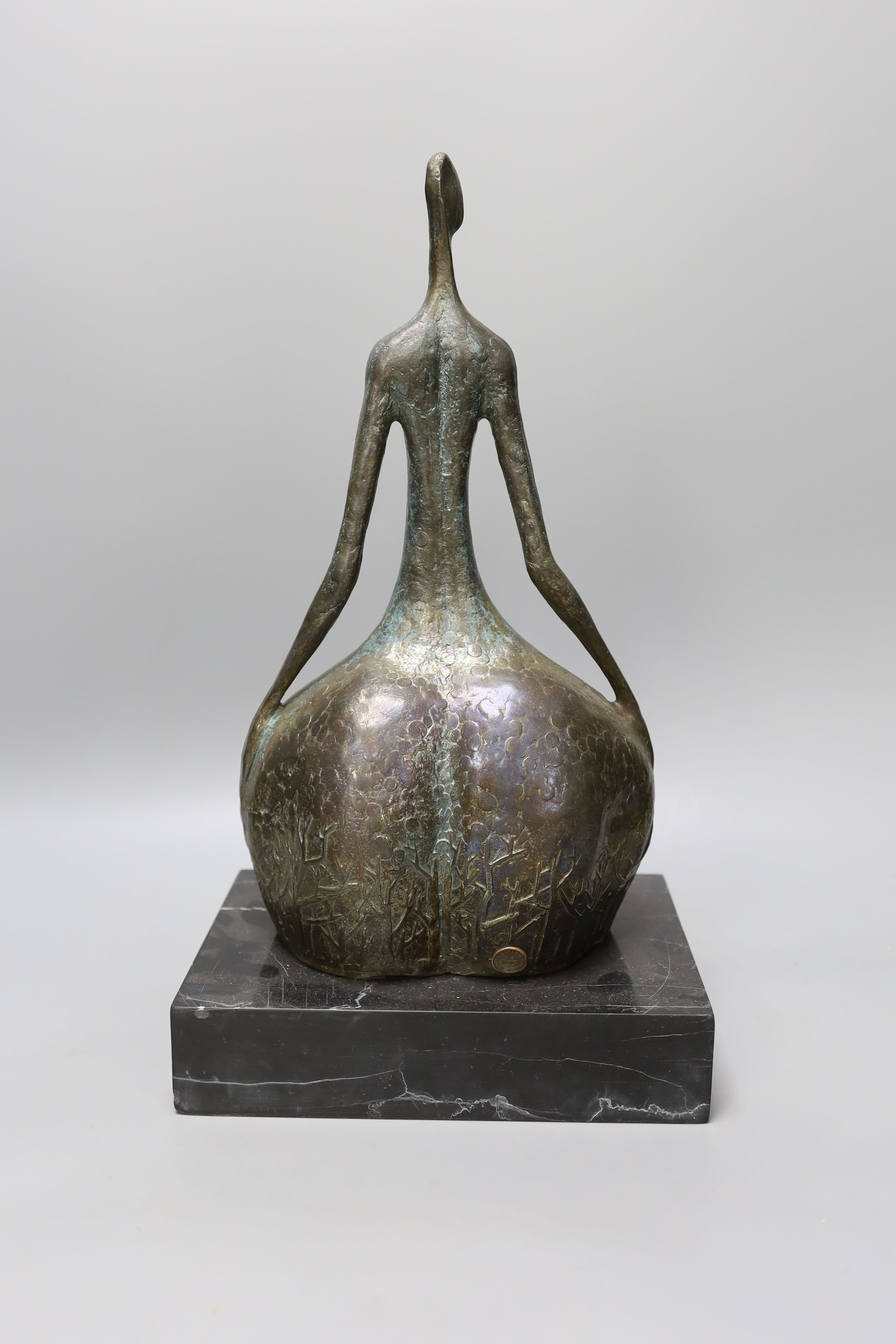 A 20th century bronze study of a stylised nude female - 40cm tall